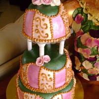 Pink And Green Whimsical Cake This cake was covered in fondant and painted with luster dust. The roses are made of gum paste. I really enjoyed making it! Thanks for...