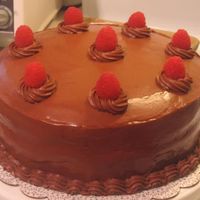 Raspberry Chocolate And Vanilla My most homemade cake to date! It's a doctored cake mix (my first time), 1/2 chocolate, 1/2 vanilla, with raspberry filling and the...