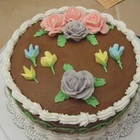 Final Cake Course 1 My first attempt at roses. I think my icing was a little too stiff. I was just amazed I could make a rose that actually resembled a rose!