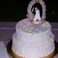 50Th Anniversary I made this for my parent's 50th wedding anniversary with their original cake topper from 50 Years ago. New lace and flowers though.