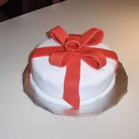 Red Bow Fondant white fondant. red fondant bow. it was my first all fondant cake