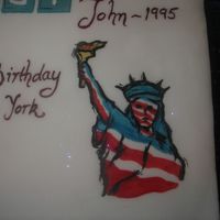 25Th Anniversary I used food colouring to paint the statue of liberty on the cake.