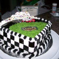 Nascar buttercream icing, fondant squares and track