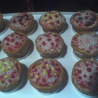 Pizza Cupcakes...... Pizza cupcakes, coconut for chese, the rest is MM fondant. Cupcakes are BC filled..... I was bored and they were for fun......