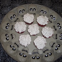 Brains!! Fun brain cupcakes! Red Velvet cupcakes with strawberry filling butter cream icing.Cool effect when you bite into them!