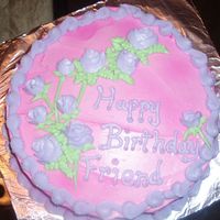Lilac Roses All BC frosting. Yellow cake with strawberries and whipped cream filling. I had a hard time with the writing so I had to cover up mistakes...