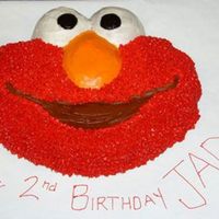 Elmo Cake Elmo cake made for my daughters 2nd birthday. This was the second cake I've ever made. The mouth is brown because I have yet to find a...