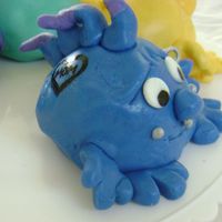 New Monsters! Party! Ive made monsters out of cupcakes before and I decided to give these ones more personality.... My interperation of a party with the punk...