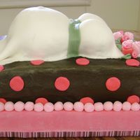 Baby Belly WASC cake with cheesecake filling and fresh strawberries, Decorated with buttercream and fondant dress, polka dots, and roses. By accident...