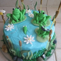 Froggy Family I made this cake for a friends Baby Shower. Chai tea cake with cream cheese frosting. She has a little boy that is way into Batman and...