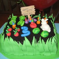 Wormy Garden Party W Grass My birthday boy asked for a "Wormy Party" cake. His 6-year old brother came up with the idea of shaping a worm into a three! Just...