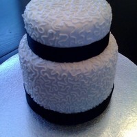 Mini Wedding Cake This is my first time doing cornelli lace and second time working with fondant. I made this as a mock wedding cake for a couple who have...