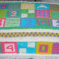 Baby Blanket Shower Cake the colors seem very bright in the pic. they were a little less bright in person.