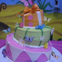 Whimsical Garden a co-worker of my asked if I can make her daughter's first birthday cake and gave me a pic of a cake store logo which was the cake....