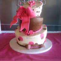 Girly Baby Shower chocolate/strawberry/vanilla cakes all with strw. filling/bc frosting. this was my attempt to a mad hatter whimsical cake. fondant accents...