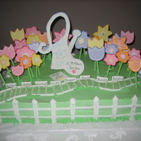 A Mother's Gift choco/strw filling/bc frosting. church requested a cake and thought flowers were a hit on mother's day so why not a garden of wisdom....