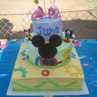 Minnie Mouse Clubhouse My niece's first bday. 1st tier choco/straw filling 2nd tier strawberry/straw filling 3rd tier pina colada. all bc with fondant...
