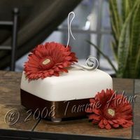 Gerbera Daisy Practice Cake This is just a 6" practice cake. It's what will be the top tier of my first wedding cake that I'll be making next month. I...