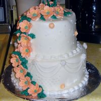 Wilton Level 3 Class Royal Icing petunias (that I wasn't too happy with), covered in fondant. The fondant was made from two recipies I got from my teacher...