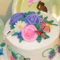 Top Of Kelly's Butterfly Cake This is the top of the cake I made. Each tier is one layer of strawberry cake and one layer of banana cake, with raspberry preserves in...