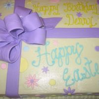 Easter Cake BC with fondant bow and accents. This was for Easter and a birthday.