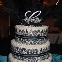 Emily's Wedding the cake was a WASC with a buttercream layer, strawberry layer and lemon layer. The "print" is a luck's image.. Bride's...