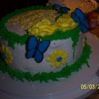 Butterfly/garden Cake Made for my garden loving neighbor for her birthday. Handmade royal icing butterflies, and BC "moss" and roses.