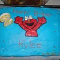 Elmo Cake My youngest daughter loves Elmo, so I made this cake for her 2ndbirthday. It was a marble cake with butter cream frosting. His eyesare mini...