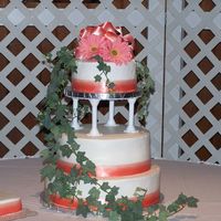 First Wedding Cake this is my first try at a tiered and stacked cake. It was also my first wedding cake. I don't think it turned out to bad. The top and...