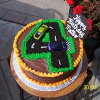 Hot Wheels Birthday Cake All buttercream. "Road" is made of crushed oreo's and black decorating sugar.