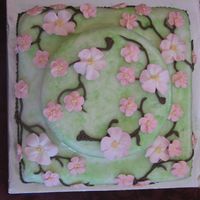 Cherry Blossoms White cake w/ citrus rolled buttercream. This was the 1st and only time I used rolled buttercream. It seemed "oily" to me, but...