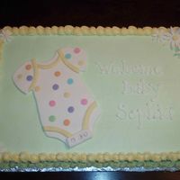 Baby Shower Cake BC with Fondant Onesie and sprinkle polka dots.