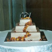 Weddingfallcakechrisjess1.jpg Fall square wedding cake. Fondant Fall leaves and fondant cranberries.