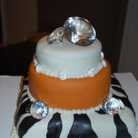 Zebras And Diamonds! Oh My!! Marshmallow fondant over buttercream icing. All cakes are vanilla, bottom has strawberry filling, center has cream cheese filling and top...