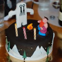 Sasquatch Cake Cake made for a friend, the Sasquatch or Bigfoot is made to look like a tattoo of his. All fondant, including people, fire and Sasquatch....