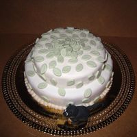 Leaves Cake This is a cake I made for my friends birthday. All fondant, little fondant kitty on the side that is made to look like her cat.