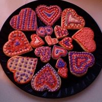 Valentine Cookies Decorated by my eight year-old daughter and I... can't tell who did which!