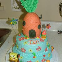 Spongebob Squarepants This was for my son's 6th birthday. I used an styrofoam ostrich egg for the pineapple which I covered with fondant that I colored...