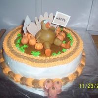 Happy Thanksgiving Thanksgiving cake. Turkey & pig in pumpkin patch. I went w/ a turkey & a pig due to turkey/ham being main course.. LOL Turkey...