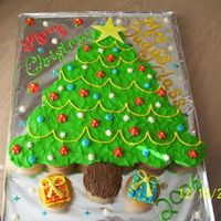 Christmas Tree Ccc First ever cupcake cake. I had been wanting to make one.. I made this very last minute for sons' 1st grade party. (I ran into his...
