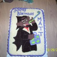 Sesame Street The Count Cake Cake was done for a neighbor who requested the Count for her hubby's birthday. All iced in buttercream on a chocolate butter cake....