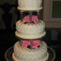 Swirls And Buttercream a small wedding cake with royal icing swirls