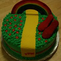 Wizard Of Oz Cake I made this for my friend's daughter's birthday. Chocolate cake with oreo filling, buttercream icing. Flowers are RI done in...