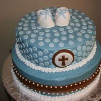 Baptism Cake I made this cake for my son's baptism. It is buttercearm with fondant accents and gumpaste booties. It matched the design of his...