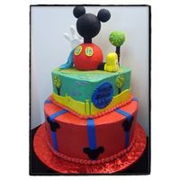 The Playhouse This was for a 1st Birthday Party. Mickey's Playhouse. Buttercream with fondant accents.