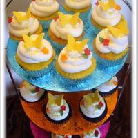 Butterfly Cupcakes Lemon Coconut and Chocolate Cupcakes with vanilla buttercream, gumpaste butterflies, fondant flowers and yellow non-pareils.