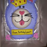 A Fourth Birthday Cake. Frosted with buttercream, white with lemon filling, and the crown and collar are MMF. She was thrilled! :)