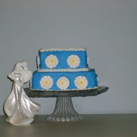 S5000004.jpg This was for my best friend. She wanted a very small nontraditional cake for her wedding. (she knew I was very inexperienced.). Her colors...