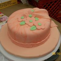 Tmpphprfgeoj.jpg Just a practice cake to learn how to cover a round cake and make drape.
