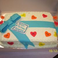 Gabrielle's Birthday This cake was done for my Pastor's 14 year old daughter. It was a chocolate cake with mint buttercream icing. The bow and hearts on...